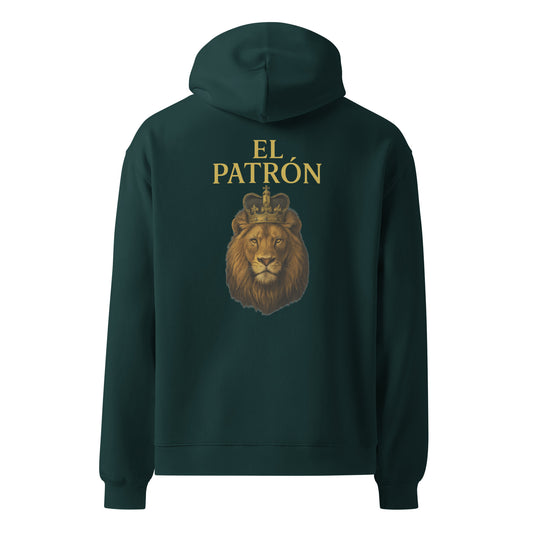 TRØBL hoodie ontwerp met goudgele tekst “El Patrón” boven een realistische leeuw met kroon, op zwarte achtergrond.